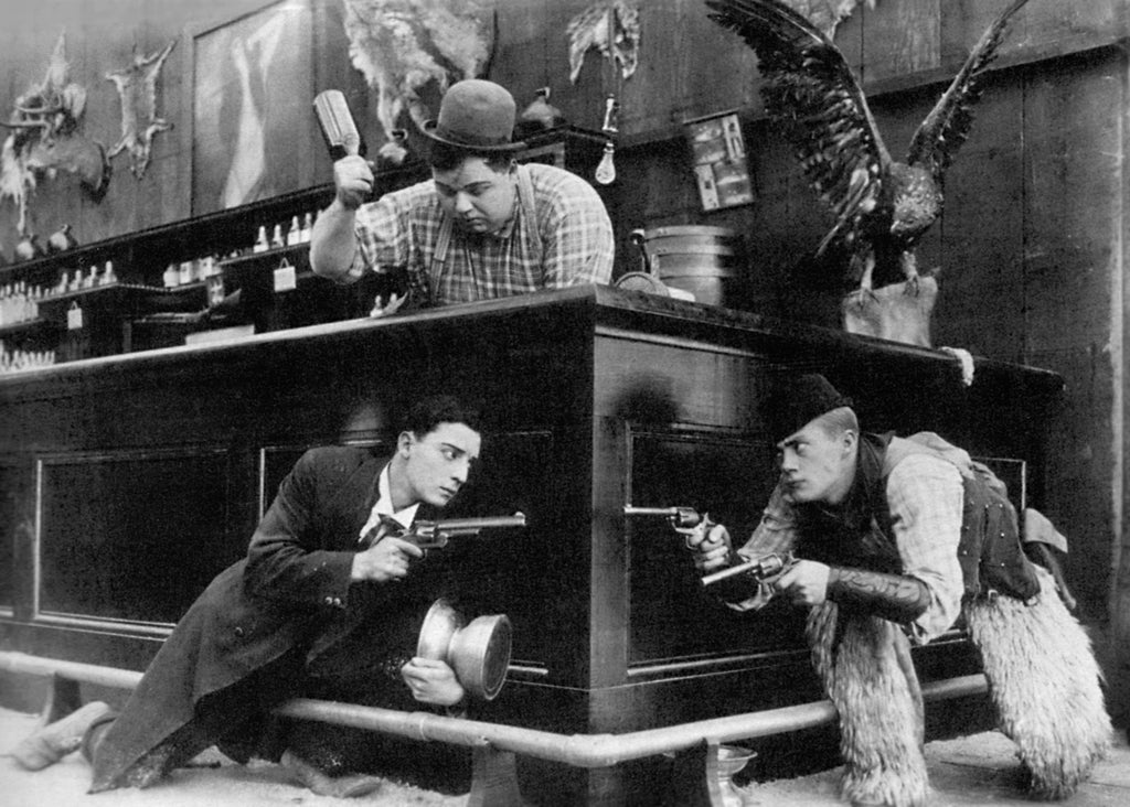 Buster Keaton, Roscoe "Fatty" Arbuckle and Al St. John (Out West, 1918)