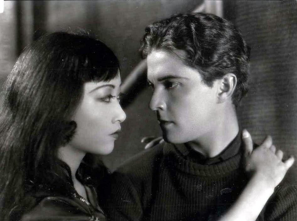 Anna May Wong and Ramon Novarro (Across to Singapore, 1928) | www.vintoz.com