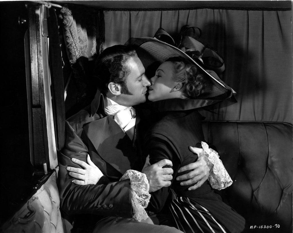George Sanders and Carole Landis in A Scandal in Paris (1946) | www.vintoz.com