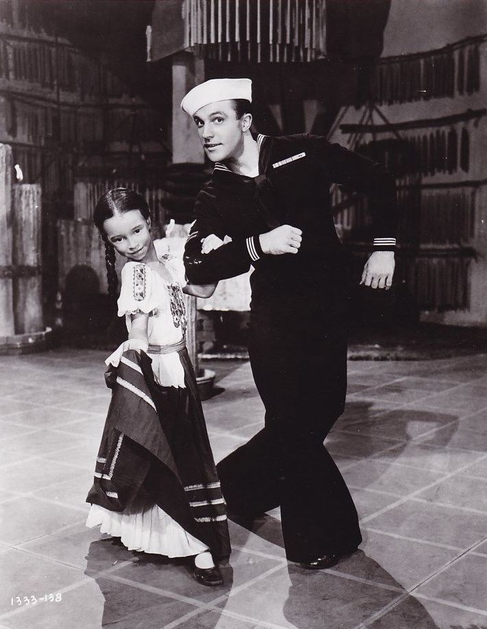 Gene Kelly and Sharon McManus in Anchors Aweigh (1945) | www.vintoz.com