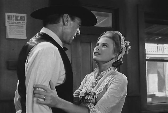 Gary Cooper and Grace Kelly in High Noon (1952) | www.vintoz.com