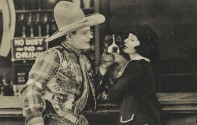 Mae Busch and Buck Jones in Pardon My Nerve! (1922) | www.vintoz.com