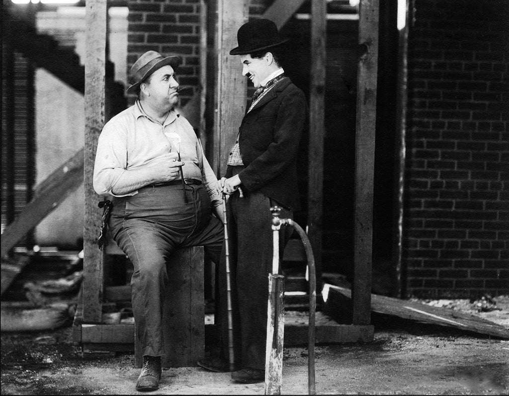 Charles Chaplin and Mack Swain in Pay Day (1922) | www.vintoz.com