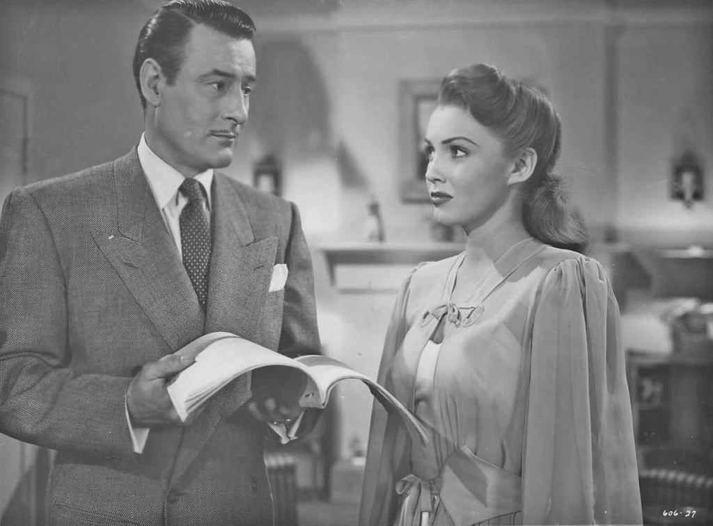 Tom Conway and Joan Leslie in Repeat Performance (1947) | www.vintoz.com
