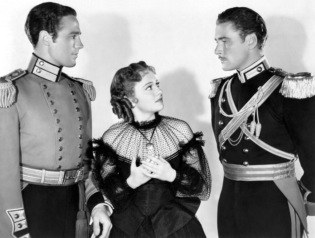 Olivia de Havilland, Errol Flynn and Patric Knowles in The Charge of the Light Brigade (1936) | www.vintoz.com